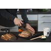 Cutting board and knives cutting bread